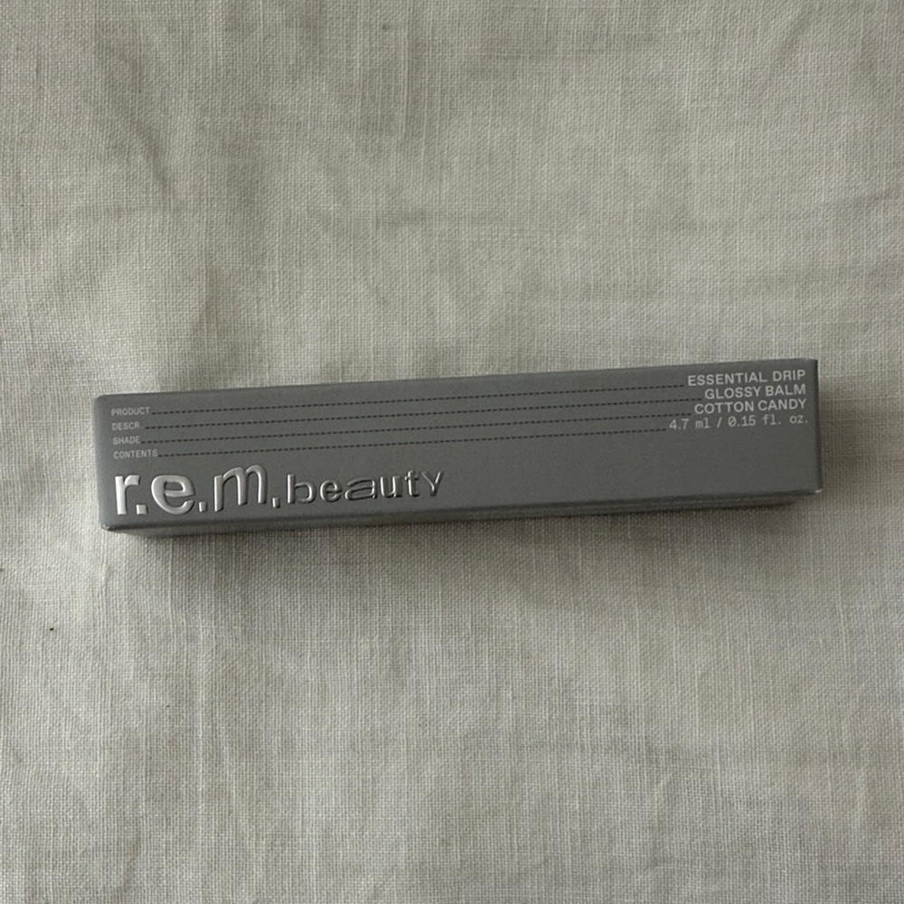 NIB REM beauty lip gloss cotton candy